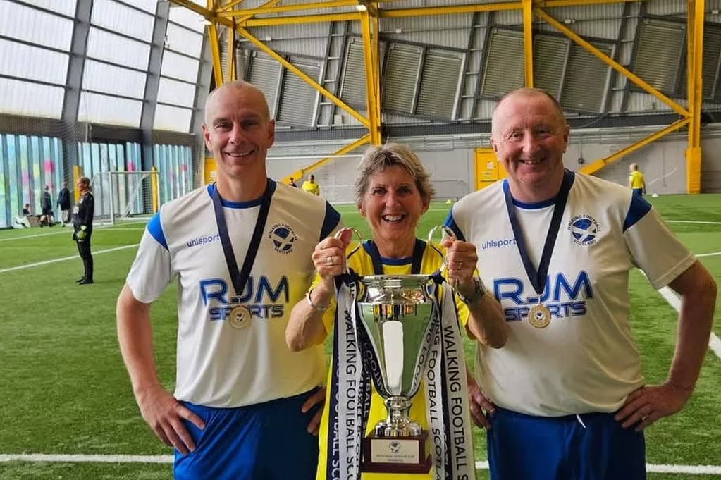 Saints Walking Footballers Tony Muirhead and Andy Durham won the Over-50s Men's Regional Cup with Cindy Halliday enjoying success in the Over-50's women's competition
Saints Walking Footballers helped South West Scotland secure victories in national championships.
Players were chosen for the Over-50s Men’s Regional Cup and the Over-50s Women’s Regional Cup in Glasgow – and it proved to be a successful day.