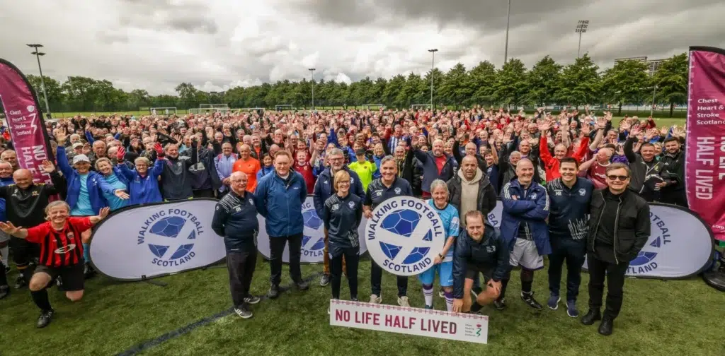 A summer of sport kicked off on Saturday 7th June as the world’s largest one-day walking football tournament returned to Glasgow Green Football Centre.
The Walking Football Scottish Cup, organised by Walking Football Scotland and sponsored by leading Scottish health charity Chest Heart & Stroke Scotland, took place at Glasgow Green Football Centre, with more than 900 players from across Scotland competing in the tournament across various categories.
Chest Heart & Stroke Scotland and Walking Football Scotland have been in partnership for two years to improve health outcomes for over fifties across Scotland.