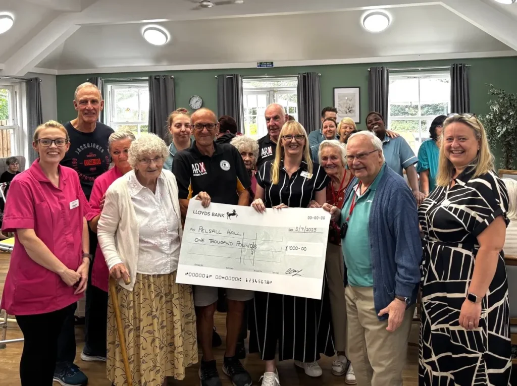 Old Corinthians Walking Football - A thousand pounds has been donated to a Walsall care home by Old Corinthians Walking Football Club which will pay for a state-of-the-art sensory table to enrich the lives of residents.
The money was raised at a recent football match and community fundraising day held at Dales Lane, home of Rushall Olympic FC.
