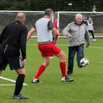 A football manager says it is "empowering" to watch a team of people with Parkinson's disease playing the game. Nigel Osmond manages around 20 walking football players at Portishead Town FC who are getting ready for their first fixture on Saturday. The sport allows some players to do more on the pitch than their symptoms would allow them to do off it, participants say, and also helps them socialise.