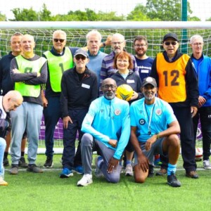 Since its launch in April 2025, more than 230 people with Parkinson’s have joined walking football projects at 14 EFL Club charities across England. Supported by a funding boost from the Football Association (FA) and training from Parkinson’s UK for football coaches and instructors, the sessions have continued to go from strength-to-strength at clubs such as Norwich City, Bromley, Stockport County and Mansfield Town, among many others.