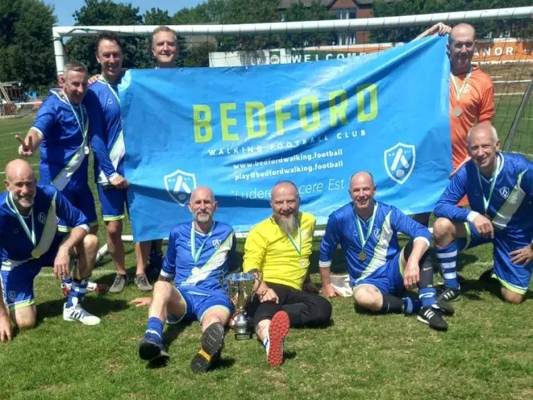 Bedford’s over-50s walking football side are celebrating after kicking off their summer in style with a first tournament victory of the season ahead of their inaugural Walking Football Festival on Saturday, 27 June.