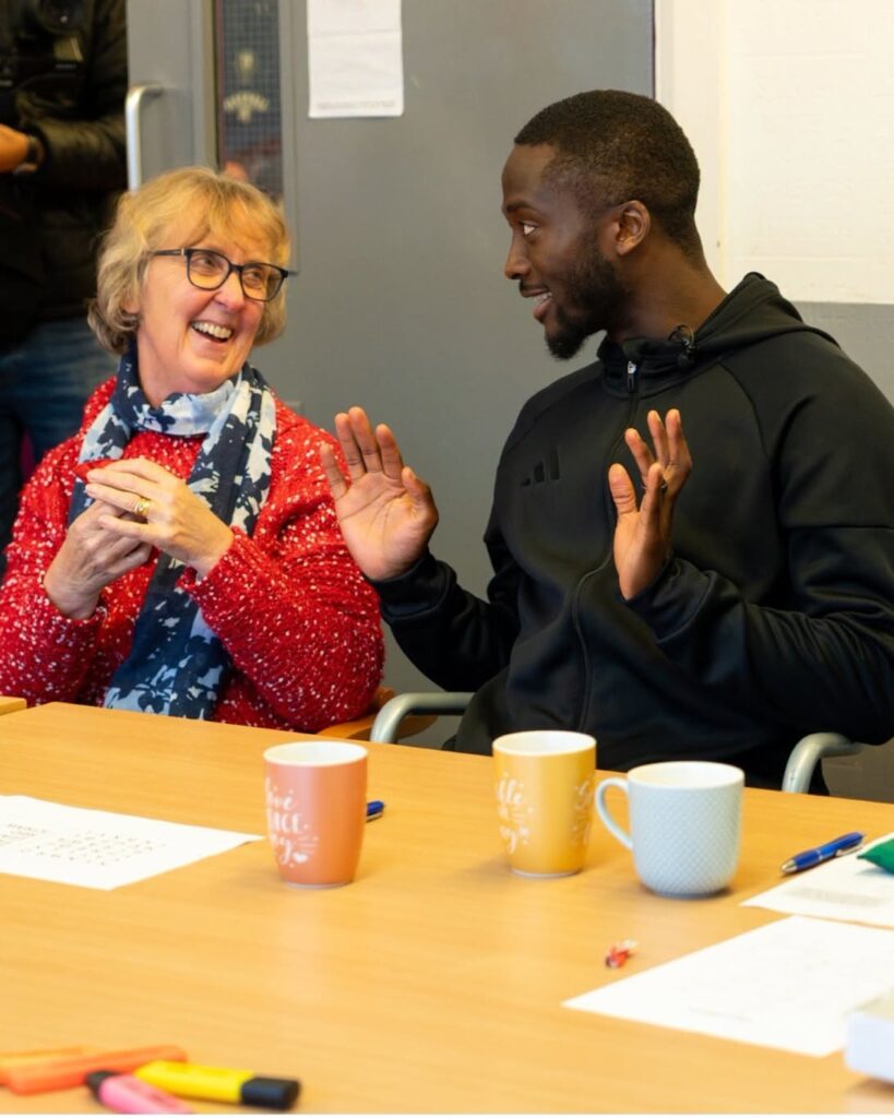 Jackie, who lives with dementia, has attended the sessions regularly for several years. Initially, she came independently, but as her support needs have increased, Colin has started attending alongside her.
What began as a way to support his wife has become something Colin enjoys in his own right.
The sessions give Colin the chance to revisit his favourite childhood game football. He enjoys kicking a ball around and taking part in small games with fellow participants and staff. Away from the pitch, he also joins in with sudoku, anagrams and the occasional game of pool.